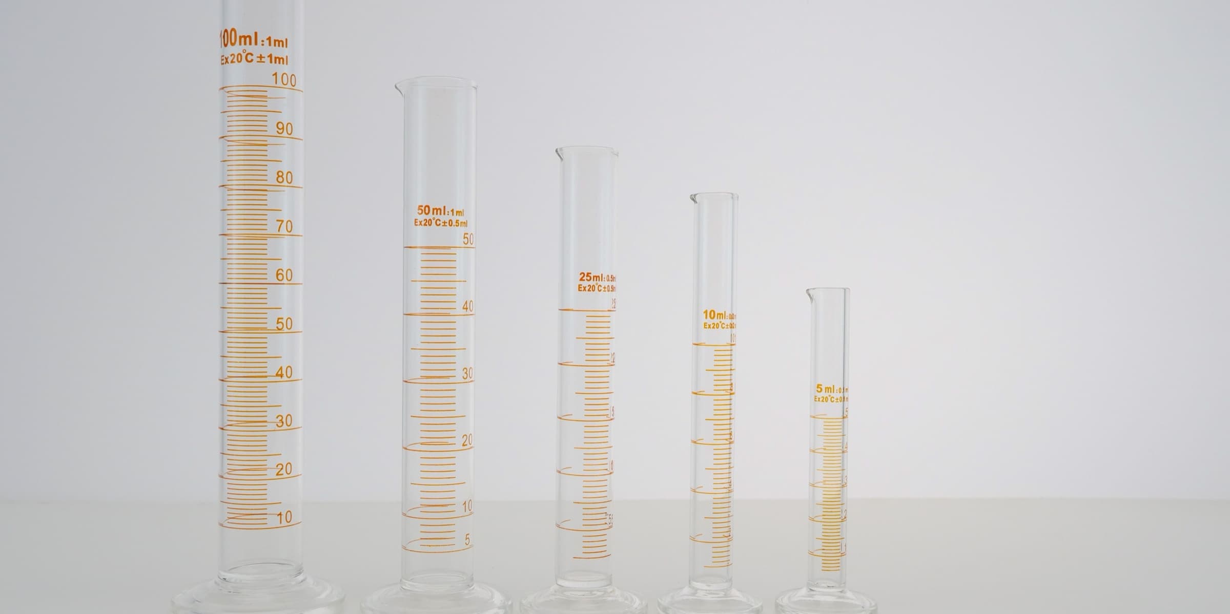 Row of laboratory graduated cylinders