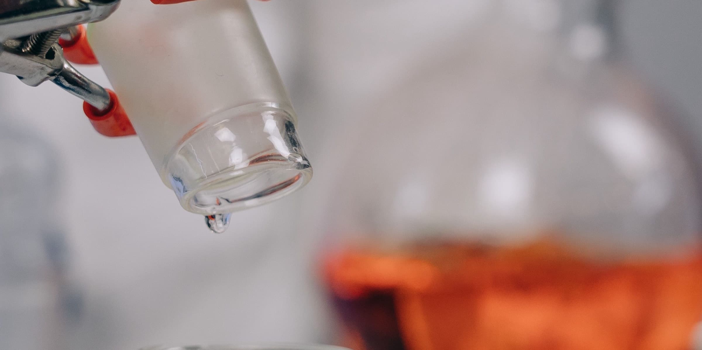 Laboratory glassware with tubes and clamps