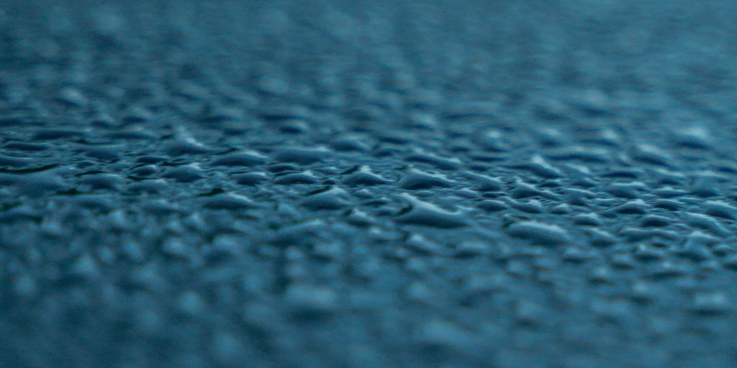 Dew drops on a car body, macro